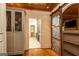 Spacious walk-in closet with custom cabinets, wood floors, and unique sliding barn door at 4421 Paradise Cir, Vinings, GA 30339