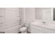 This is a full bathroom with a shower, tub, toilet and vanity at 624 Kimberwick Dr, Locust Grove, GA 30248