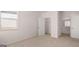 Bright bedroom with a view from the window and access to a closet and bathroom at 624 Kimberwick Dr, Locust Grove, GA 30248