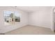 Well-lit bedroom with a large window at 624 Kimberwick Dr, Locust Grove, GA 30248