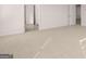 Bright bedroom with neutral carpet and white walls for a serene and inviting space at 624 Kimberwick Dr, Locust Grove, GA 30248