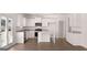 Modern kitchen featuring white cabinetry and stainless steel appliances at 624 Kimberwick Dr, Locust Grove, GA 30248