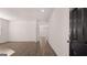 Bright living room featuring hardwood floors and neutral walls for a versatile space at 624 Kimberwick Dr, Locust Grove, GA 30248
