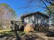 A nice elevated backyard deck provides ample outdoor space at 4935 Liberty Sw Ct, Stone Mountain, GA 30087