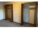 Bedroom featuring two large closets, providing ample storage space at 4935 Liberty Sw Ct, Stone Mountain, GA 30087
