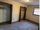 Bedroom with carpet and window at 4935 Liberty Sw Ct, Stone Mountain, GA 30087