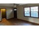 Living room with windows and hardwood-style flooring at 4935 Liberty Sw Ct, Stone Mountain, GA 30087