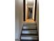 Interior view of the stairway leading to the second floor at 4935 Liberty Sw Ct, Stone Mountain, GA 30087