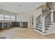 Basement featuring bar area with built-in beverage center and stainless steel appliances at 605 St. Charles Pl, Fayetteville, GA 30215
