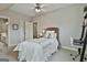 Bright bedroom with a cozy bed, stylish accents, and ample natural light at 605 St. Charles Pl, Fayetteville, GA 30215