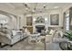 Beautiful living room features a fireplace, stylish furniture, and neutral tones at 605 St. Charles Pl, Fayetteville, GA 30215