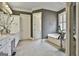 Large bathroom features dual vanities, garden tub, walk-in shower, and linen closet at 605 St. Charles Pl, Fayetteville, GA 30215