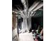 Unfinished basement with duct work, hot water heater, and storage at 4571 Scarborough Rd, South Fulton, GA 30349