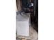 Unfinished Laundry area with washer and dryer hookups on a concrete floor at 4571 Scarborough Rd, South Fulton, GA 30349