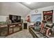 Bonus room with tiered seating, large television and a Atlanta Falcons banner and pillows at 3434 Estels Ln, Conyers, GA 30013