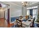 Elegant dining room with hardwood floors and wainscoting at 3434 Estels Ln, Conyers, GA 30013