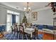 Inviting dining room with elegant wainscoting and natural light at 3434 Estels Ln, Conyers, GA 30013