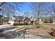Beautifully landscaped home showing mature trees and well-maintained lawn at 3434 Estels Ln, Conyers, GA 30013