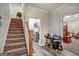 Hallway leading to bedrooms, laundry room and stairs at 3434 Estels Ln, Conyers, GA 30013