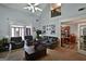Inviting living room with vaulted ceilings, ample natural light, and comfortable seating at 3434 Estels Ln, Conyers, GA 30013