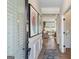 Inviting foyer with hardwood floors leading to the bright living area at 10459 Trellis Lane (Lot 27), Hampton, GA 30228