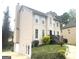 Two-story home featuring neutral siding, a driveway, and a well-maintained lawn at 3497 Thornewoode Pointe, Decatur, GA 30034