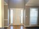 Bright foyer with wooden floors, side-light windows and a white entry door at 3497 Thornewoode Pointe, Decatur, GA 30034