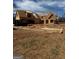 Exterior view of new construction with wood frame and gabled roof under a clear blue sky at 462 Snead Road # 2, Fayetteville, GA 30215