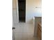 Bright bathroom featuring patterned floors and a walk-in closet at 10467 Tara Beach Cir, Jonesboro, GA 30238