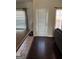 Dining area with hardwood floors and a sliding glass door to the outside at 10467 Tara Beach Cir, Jonesboro, GA 30238