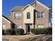 Charming two-story brick home with a well-maintained front yard, perfect for families at 10467 Tara Beach Cir, Jonesboro, GA 30238