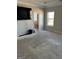 Spacious main bedroom with a view and adjacent bathroom access at 10467 Tara Beach Cir, Jonesboro, GA 30238
