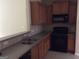 Well-equipped kitchen with ample countertop space, stainless steel sink, and modern appliances at 358 Southgate Dr, Locust Grove, GA 30248