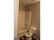 Bathroom featuring a shower-tub combination and a standard toilet at 343 Kate Dr, Forest Park, GA 30297