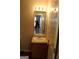 Bathroom featuring a sink vanity with a mirror and standard lighting fixture at 343 Kate Dr, Forest Park, GA 30297