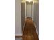 Hallway featuring wood floors and access to multiple rooms at 343 Kate Dr, Forest Park, GA 30297
