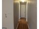 Hallway featuring wood floors and access to multiple rooms at 343 Kate Dr, Forest Park, GA 30297
