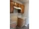 Kitchen featuring marble countertop and wood cabinets at 343 Kate Dr, Forest Park, GA 30297