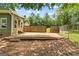 A spacious backyard with a large patio, perfect for outdoor entertaining and relaxation at 888 Laney Rd, Locust Grove, GA 30248
