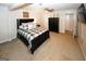 Comfortable bedroom featuring a ceiling fan, TV, and closet at 888 Laney Rd, Locust Grove, GA 30248