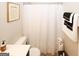 This bathroom features neutral colors, a toilet, and a shower/tub combo at 888 Laney Rd, Locust Grove, GA 30248