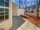 Cozy back patio area surrounded by a privacy fence at 11403 South Grove Dr, Hampton, GA 30228