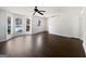 Bright living room with new flooring and natural lighting, and a front yard view at 11403 South Grove Dr, Hampton, GA 30228