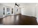 Inviting living area featuring luxury vinyl plank flooring, lots of natural light and a convenient front door entry at 11403 South Grove Dr, Hampton, GA 30228