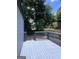 A spacious back deck with a wood railing overlooks the backyard at 1066 Ashby Sw Grv, Atlanta, GA 30314