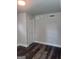 Finished basement area with wood-look flooring and white trim at 1066 Ashby Sw Grv, Atlanta, GA 30314