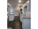 Modern kitchen featuring granite countertops, stainless steel appliances, and ample cabinet space at 1066 Ashby Sw Grv, Atlanta, GA 30314
