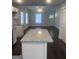 Open concept kitchen featuring an island with a granite countertop and modern finishes at 1066 Ashby Sw Grv, Atlanta, GA 30314