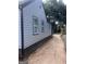 Side exterior view of the house with a long driveway at 1066 Ashby Sw Grv, Atlanta, GA 30314