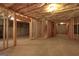 Unfinished basement with wood framing ready to be built for customization at 168 Maple Grove Ter, Peachtree City, GA 30269